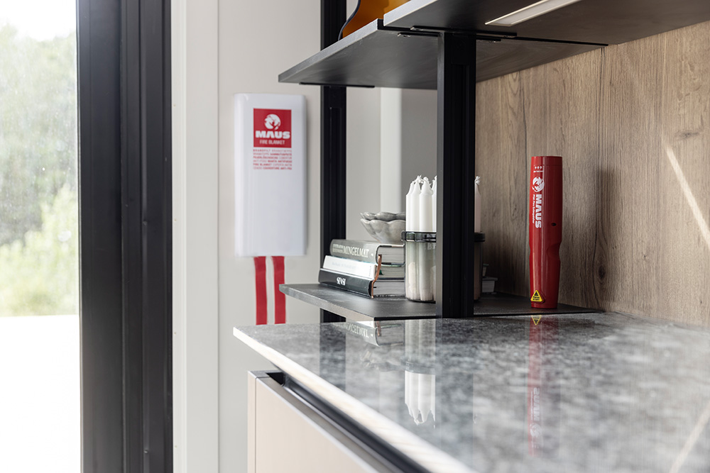 MAUS fire extinguishers in a kitchen.